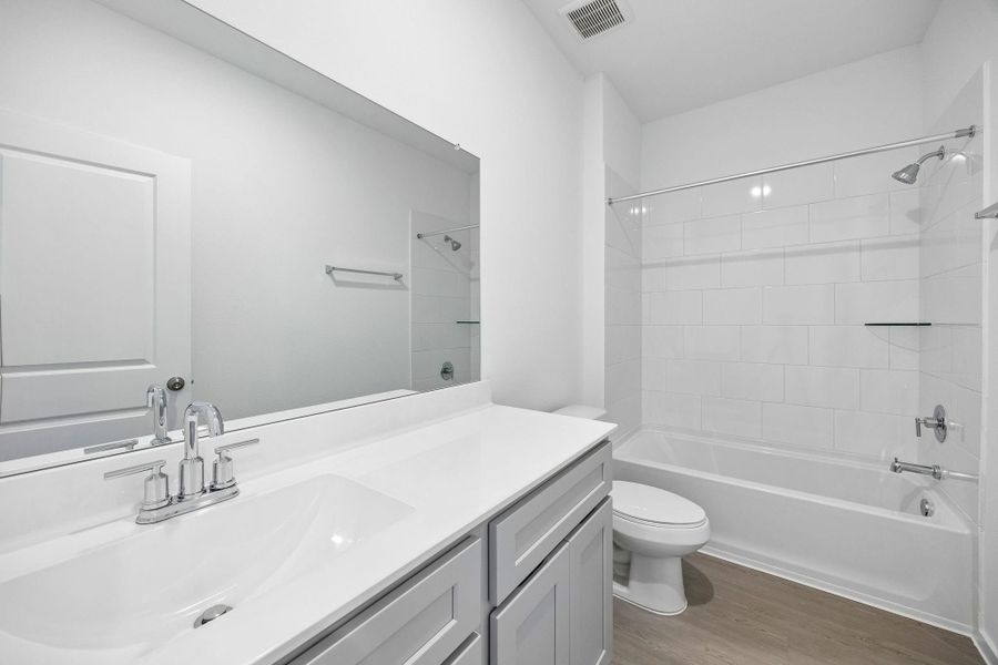 Furnished interior view inside a new home in Mavera, Conroe (Image 12).