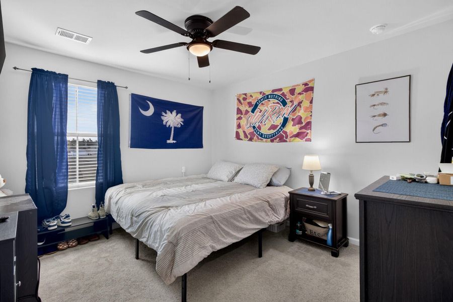 Furnished interior view inside a new home in Lindera Preserve at Cane Bay Plantation, Summerville (Image 17).