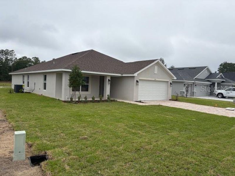 Exterior details and patio area of a home in Juliette Falls, Dunnellon (Image 2). Exterior details and patio area of a home in Juliette Falls, Dunnellon (Image 2).