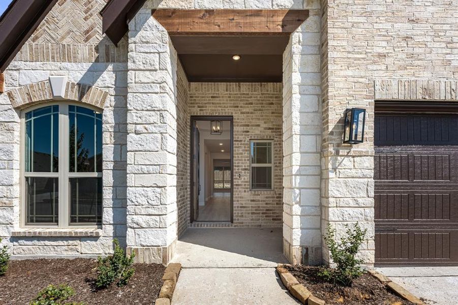 Front exterior of a new home in Maplewood, Glenn Heights, TX, highlighting curb appeal (Image 26). Front exterior of a new home in Maplewood, Glenn Heights, TX, highlighting curb appeal (Image 26).