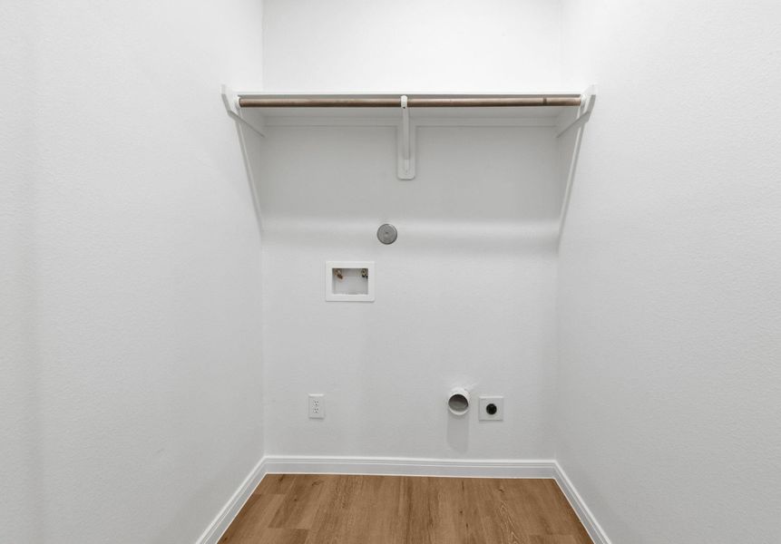 Functional laundry closet designed for efficiency