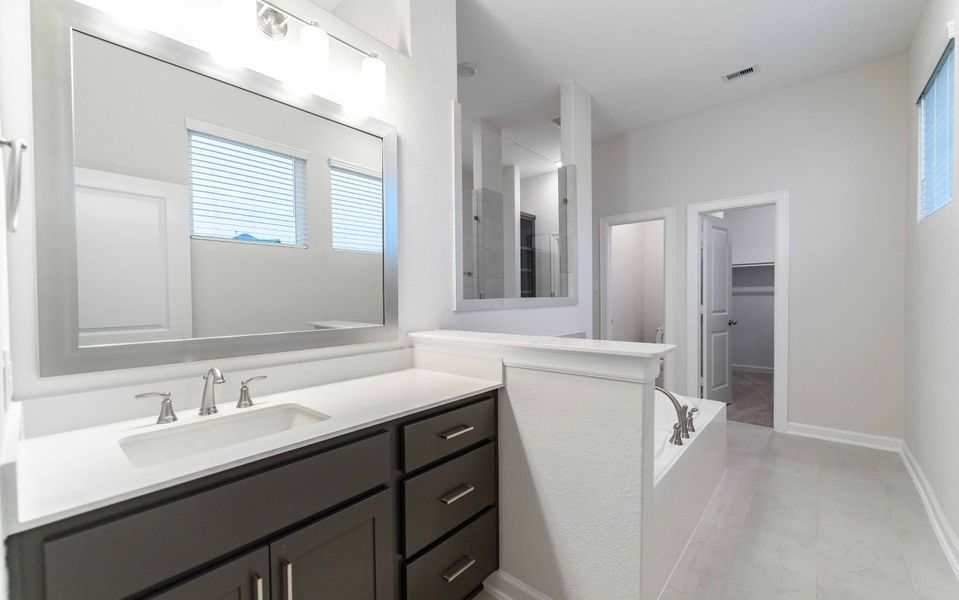 Furnished interior view inside a new home in Marvida, Cypress (Image 9).