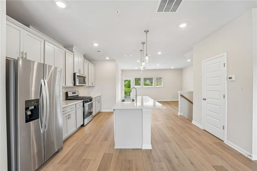 Furnished interior view inside a new home in Hemingway - Highland Series, Cumming (Image 13).