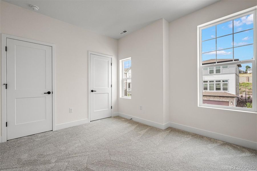 Spacious, unfurnished interior of a new home in Trailside at Cottonwood Creek, Colorado Springs (Image 30).