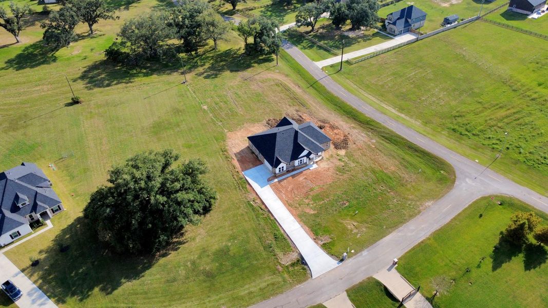 Front exterior of a new home in , Rosharon, TX, highlighting curb appeal (Image 1). Front exterior of a new home in , Rosharon, TX, highlighting curb appeal (Image 1).