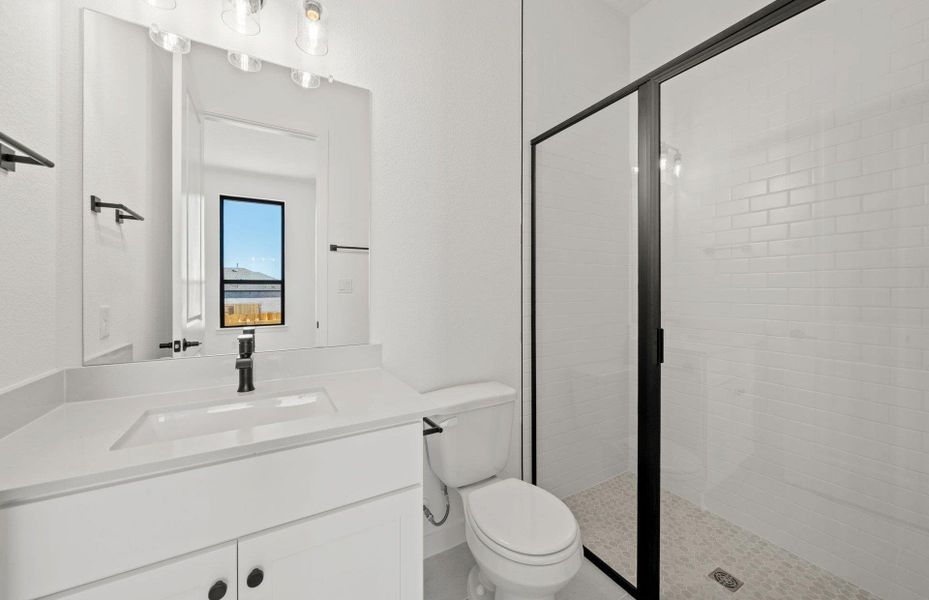 Furnished interior view inside a new home in 6 Creeks, Kyle (Image 10).