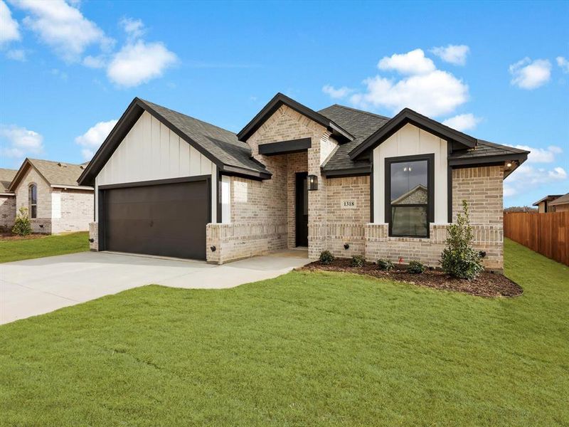 Front exterior of a new home in , Tolar, TX, highlighting curb appeal (Image 23). Front exterior of a new home in , Tolar, TX, highlighting curb appeal (Image 23).
