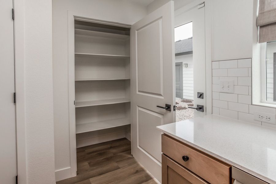 Furnished interior in a model home at Prairie Song Cottages in Windsor (Image 22). Furnished interior in a model home at Prairie Song Cottages in Windsor (Image 22).