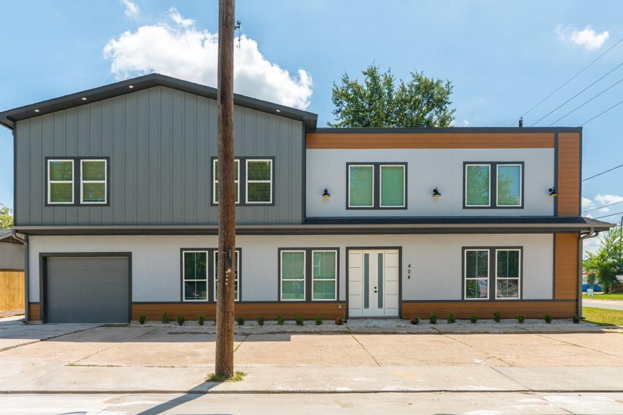 Front exterior of a new home in , Humble, TX, highlighting curb appeal (Image 1). Front exterior of a new home in , Humble, TX, highlighting curb appeal (Image 1).