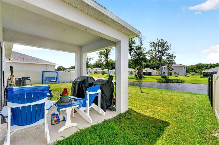 Exterior details and patio area of a home in , Edgewater (Image 4). Exterior details and patio area of a home in , Edgewater (Image 4).