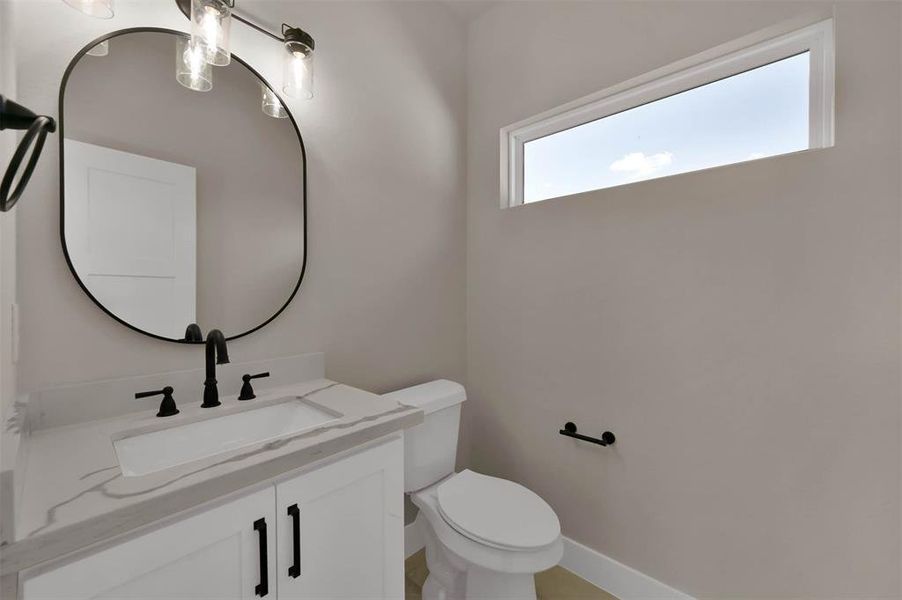 Similar Half Bath located of the Game room Built by Tx Best Home Builders