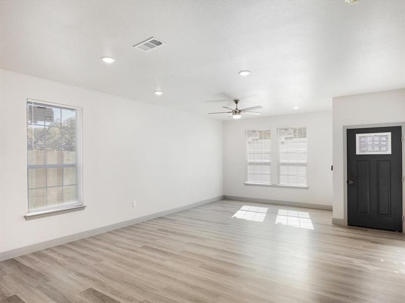 Entryway with light wood-style floors, recessed lighting, and a ceiling fan