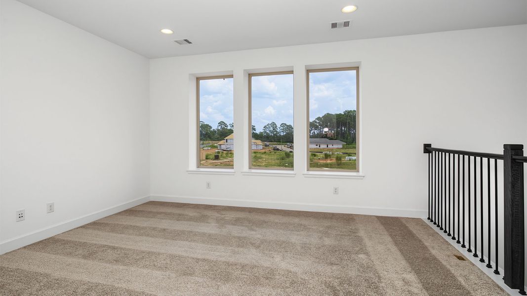 Spacious, unfurnished interior of a new home in The Woodlands Hills, Willis (Image 9).