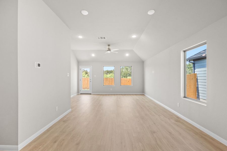 Living Room in the Spruce home plan by Trophy Signature Homes - REPRESENTATIVE PHOTO Living Room in the Spruce home plan by Trophy Signature Homes - REPRESENTATIVE PHOTO