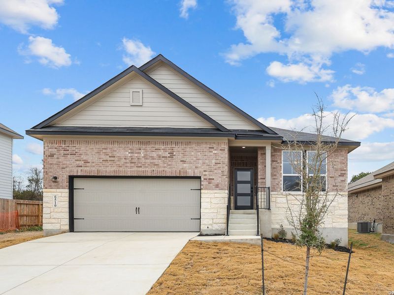 Front exterior of a new home in Royal Crest, San Antonio, TX, highlighting curb appeal (Image 21).