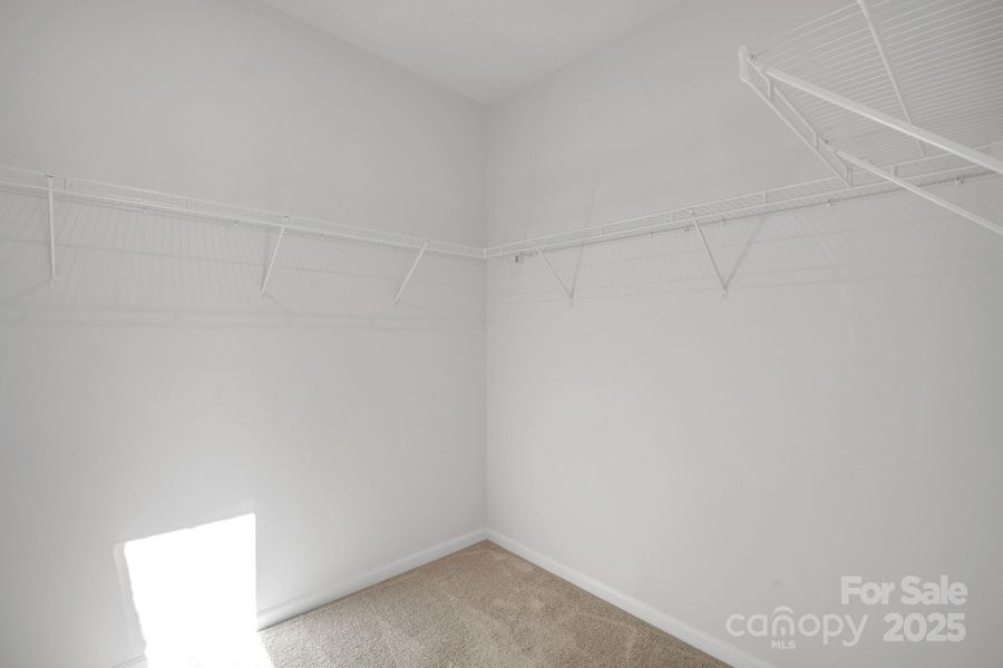 Primary - Walk in Closet Primary - Walk in Closet