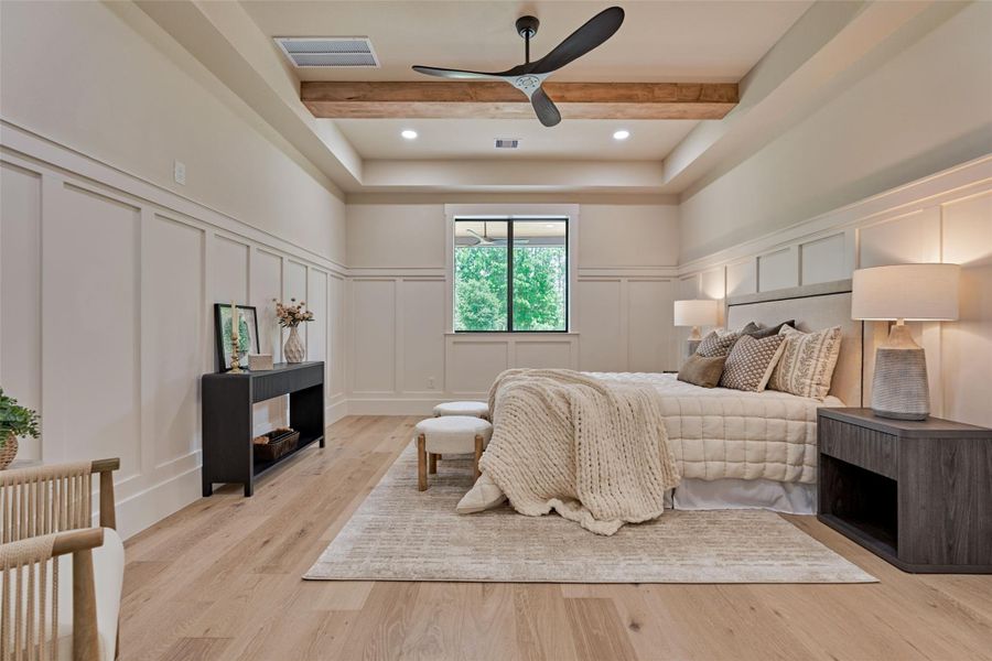 Wake up to wood beams overhead, treetop views through the window, and custom wainscoting that adds warmth and dimension to every wall. With room to spare for a sitting area and oversized furniture, this primary suite is built for rest and made to make yours. Wake up to wood beams overhead, treetop views through the window, and custom wainscoting that adds warmth and dimension to every wall. With room to spare for a sitting area and oversized furniture, this primary suite is built for rest and made to make yours.
