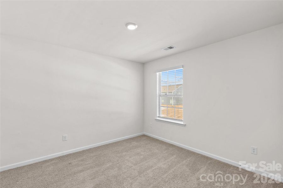 Spacious, unfurnished interior of a new home in Wallace Springs, Statesville (Image 23).