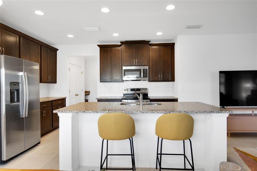 Furnished interior view inside a new home in Horse Creek at Crosswinds, Davenport (Image 10). Furnished interior view inside a new home in Horse Creek at Crosswinds, Davenport (Image 10).