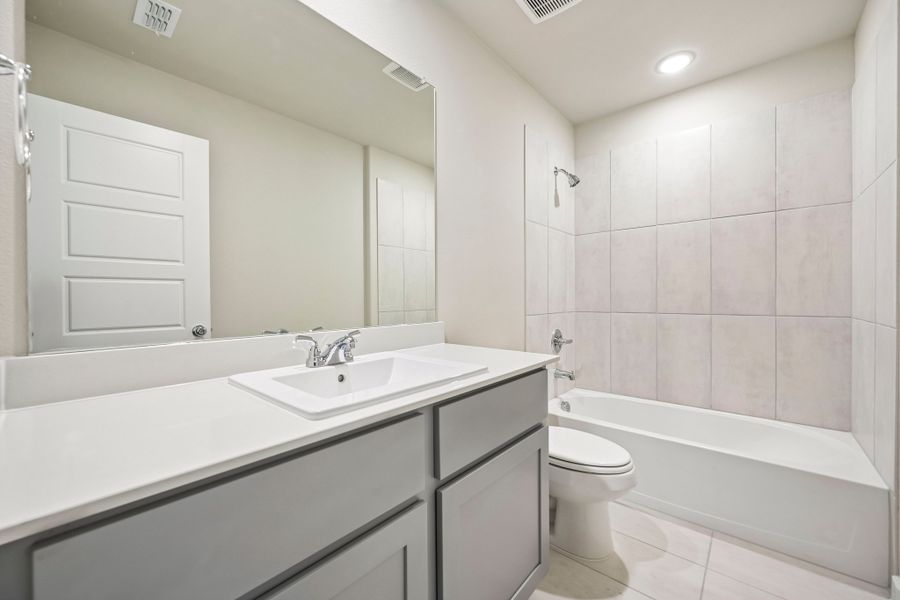 Secondary Bathroom in the Harrison home plan by Trophy Signature Homes