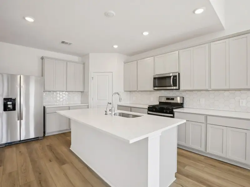 Furnished interior view inside a new home in Prairie Winds - Boulevard Collection, Hutto (Image 3).