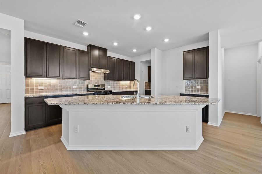 Furnished interior view inside a new home in Salerno - Classic Collection, Round Rock (Image 5).