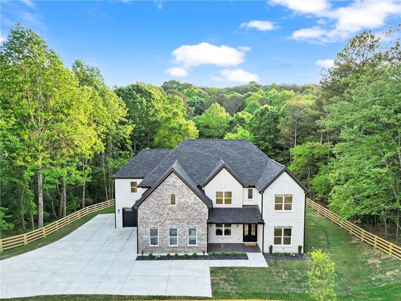 Front exterior of a new home in , Dacula, GA, highlighting curb appeal (Image 26). Front exterior of a new home in , Dacula, GA, highlighting curb appeal (Image 26).