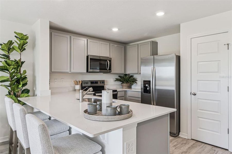 Furnished interior view inside a new home in Danbury at Ridgewood Lakes, Davenport (Image 14).