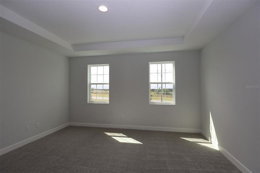 Spacious, unfurnished interior of a new home in Lake Star at Ovation, Winter Garden (Image 33).
