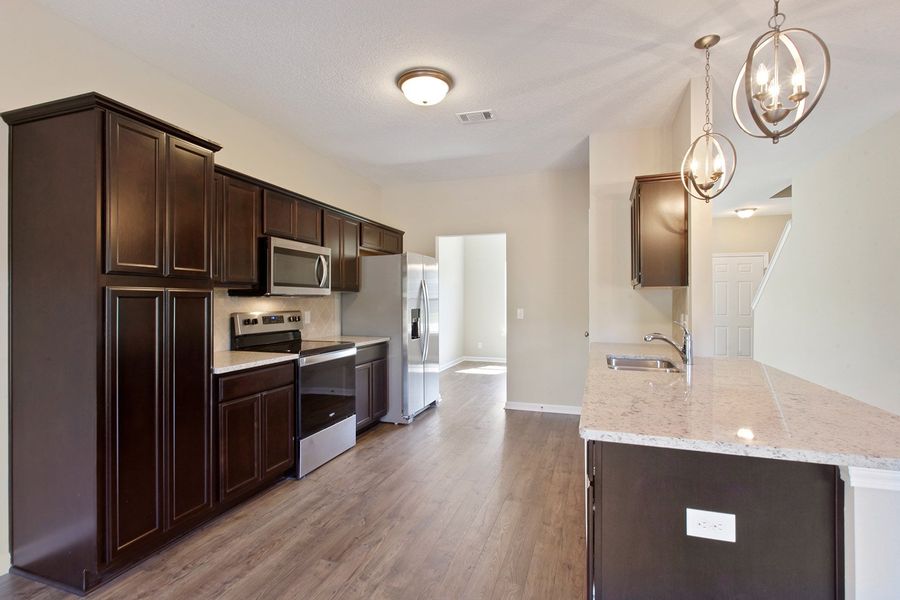 Representative furnished interior of a home built from the The Catherine by RTS Homes in The Village at Sassafras, Allenhurst (Image 37).