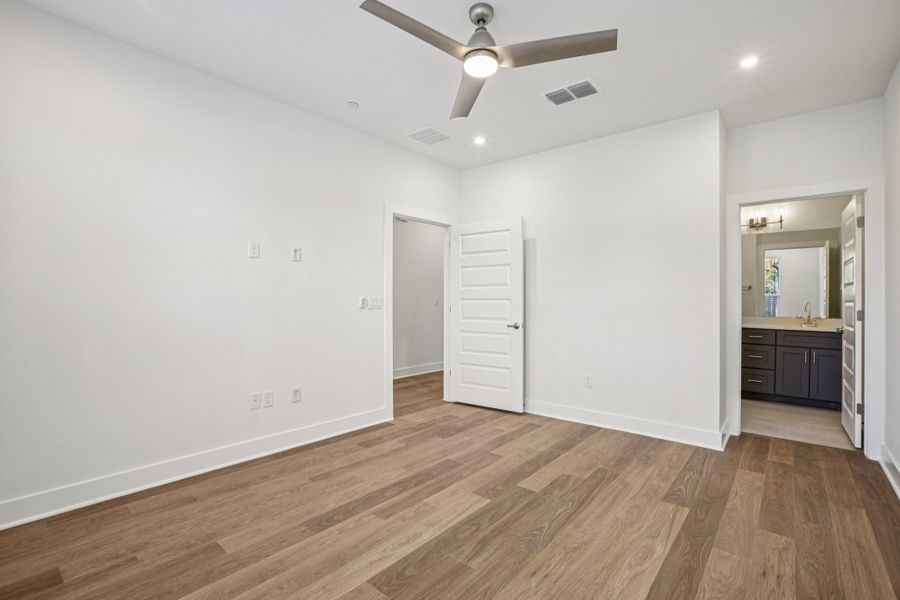 Spacious, unfurnished interior of a new home in Koenig Townhomes, Austin (Image 21).