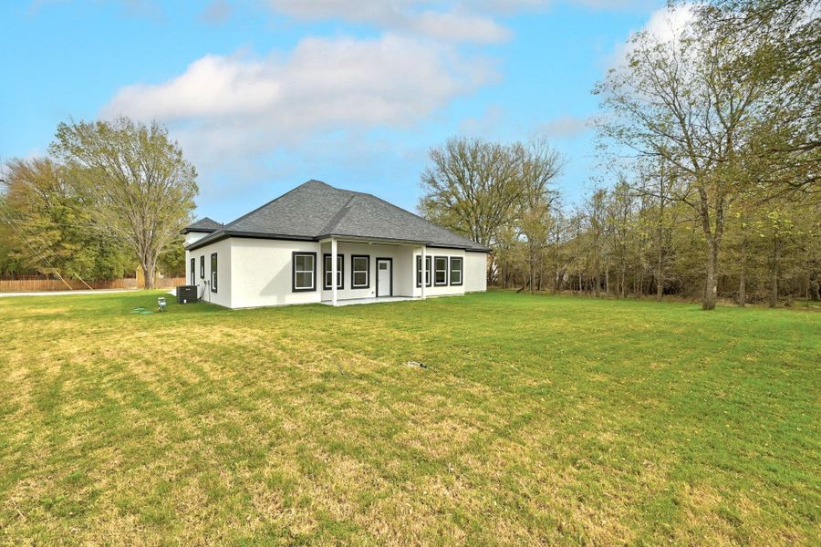 Exterior details and patio area of a home in , Bastrop (Image 27).