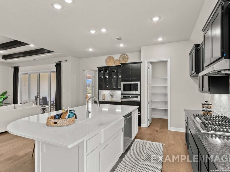 Furnished interior view inside a new home in Potranco Oaks, Castroville (Image 26).