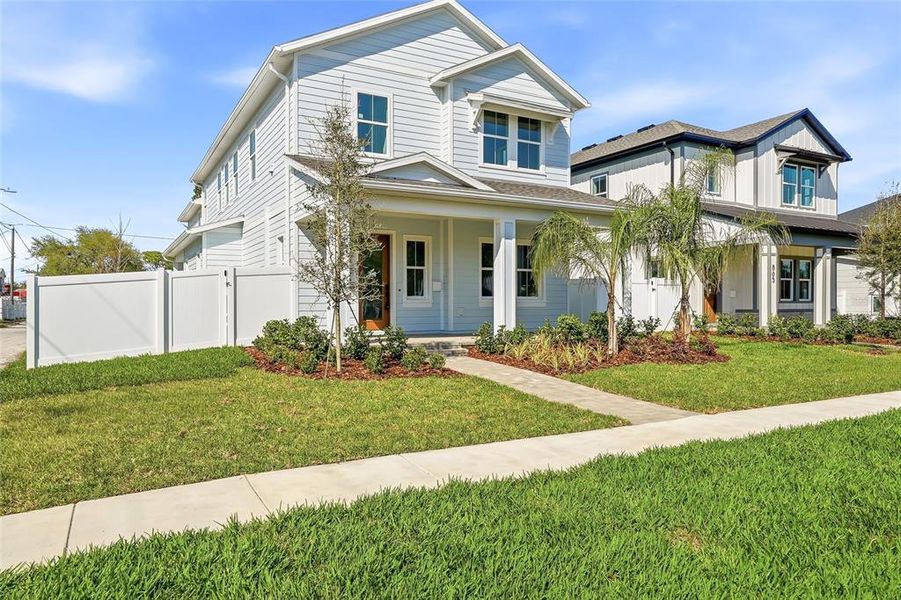 Front exterior of a new home in , St. Petersburg, FL, highlighting curb appeal (Image 27).
