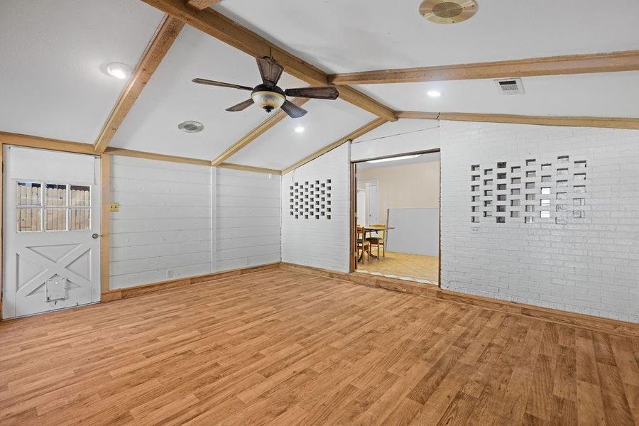 Living room with vaulted ceiling