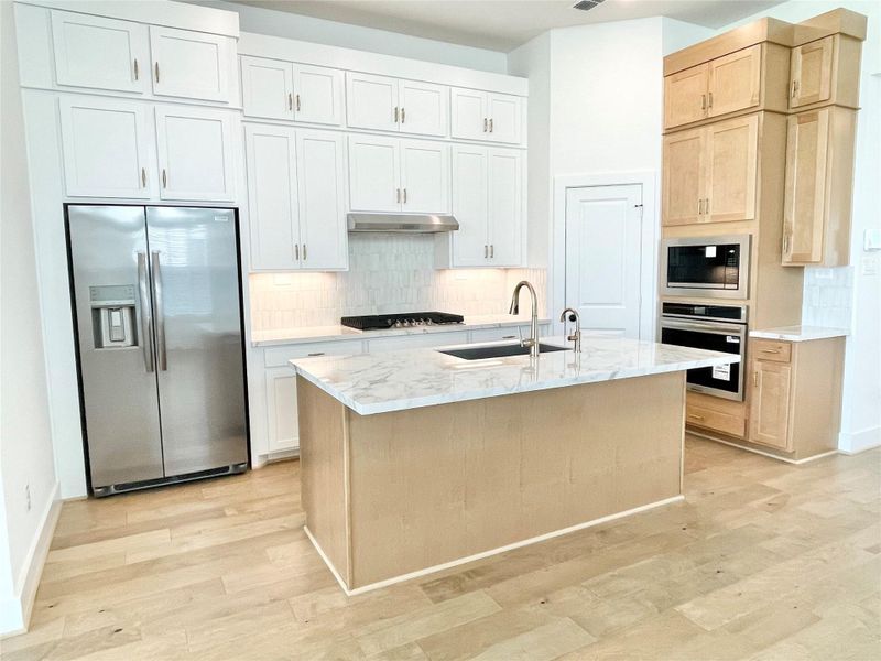 *REPRESENTATIONAL PHOTO* Open-Concept Kitchen With Island Seating