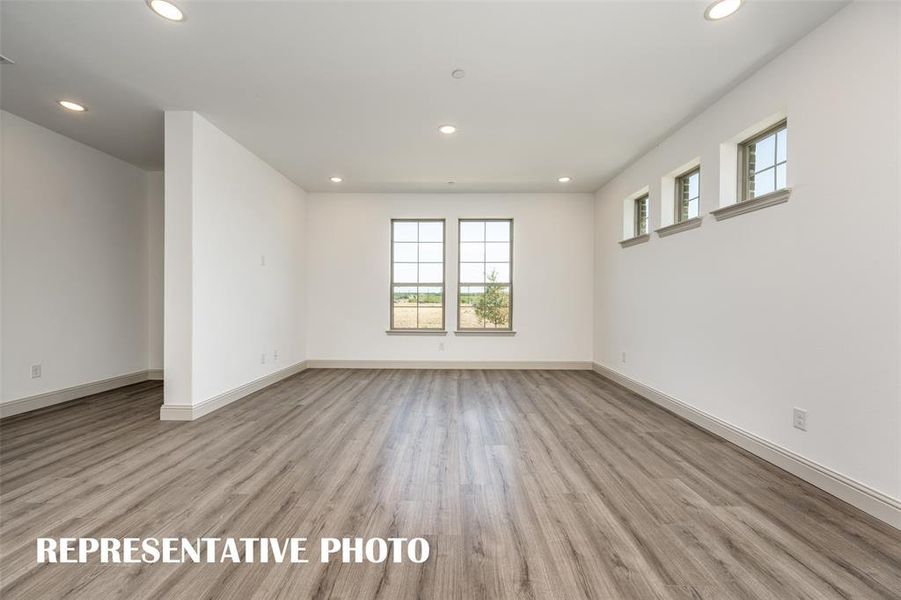 Light, bright and airy, the entire family will love this new family room!  REPRESENTATIVE PHOTO.