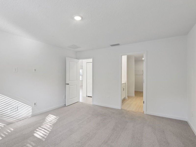 Spacious, unfurnished interior of a new home in Flagler Village - Classic Series, Palm Coast (Image 12).