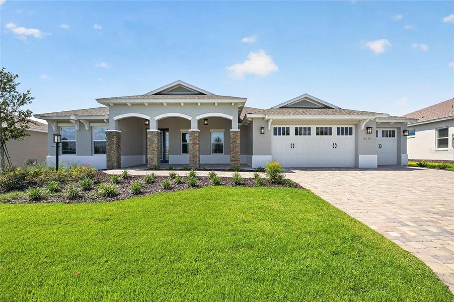 Front exterior of a new home in , Ocala, FL, highlighting curb appeal (Image 27).