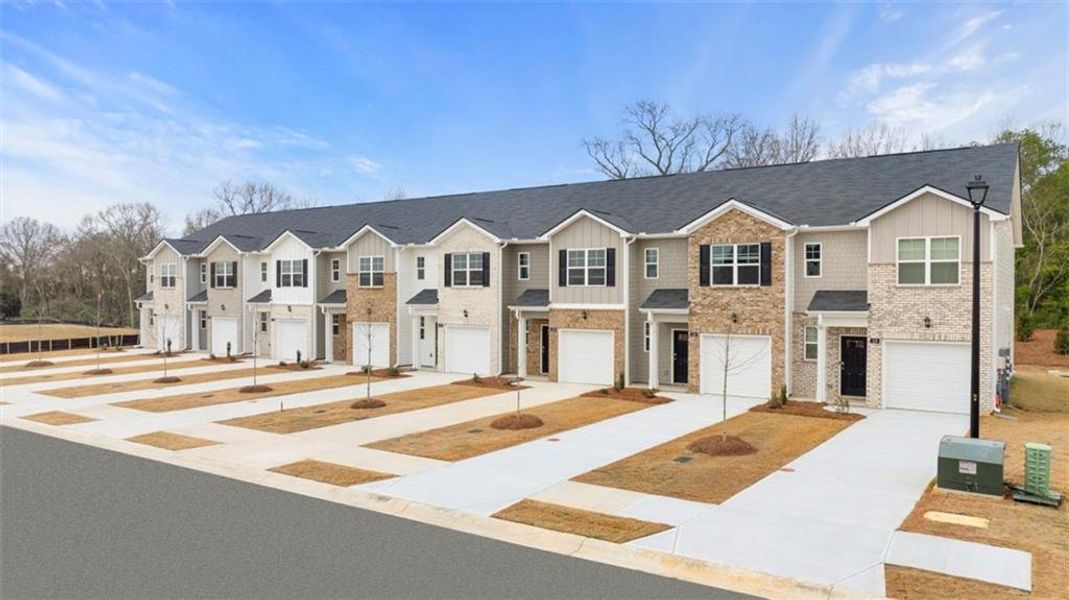 Front exterior of a new home in The Gables at Agricultural Village, Perry, GA, highlighting curb appeal (Image 17).