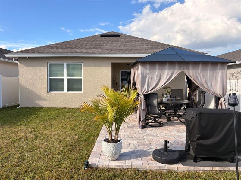 Exterior details and patio area of a home in Kindred, Kissimmee (Image 4).