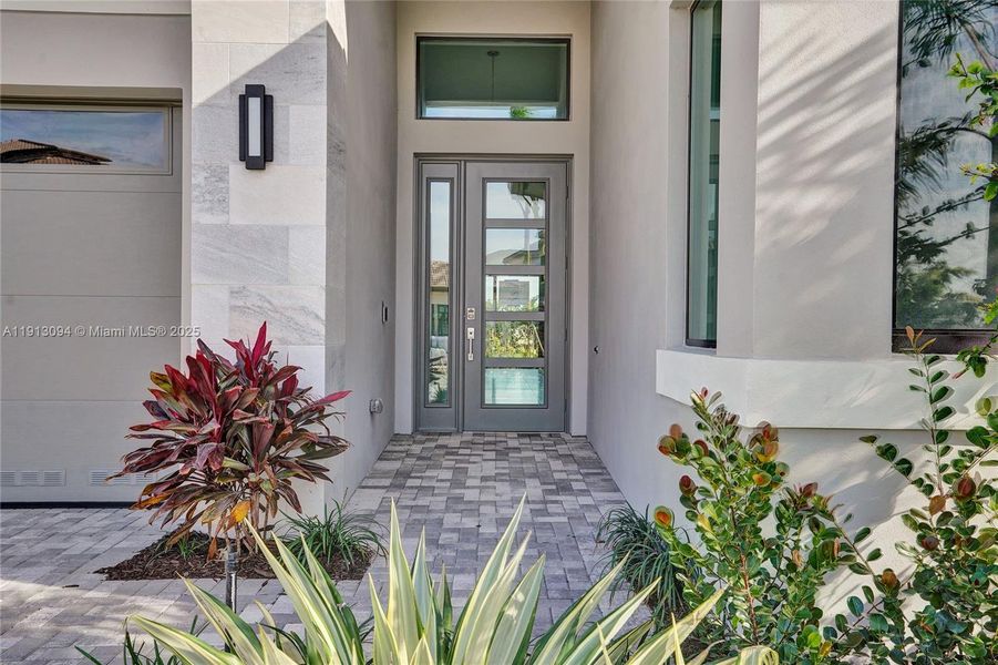 Exterior details and patio area of a home in Apex at Avenir, Palm Beach Gardens (Image 3).