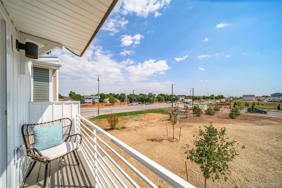 Front exterior of a new home in Reunion, Commerce City, CO, highlighting curb appeal (Image 19).