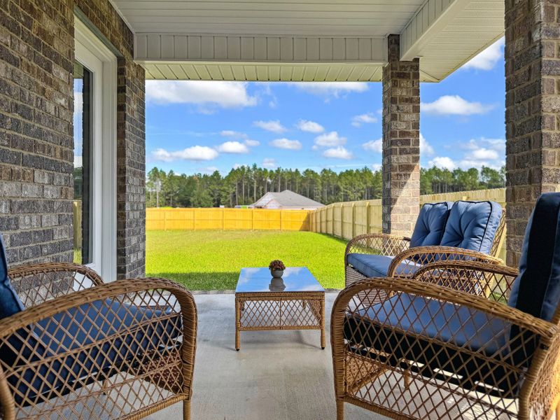 Representative furnished interior of a home built from the The Carlos by Herbst Homes in Doyle Hawkins Landing, Navarre (Image 58).