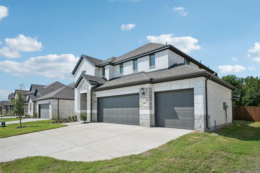 Front exterior of a new home in Windmore, Princeton, TX, highlighting curb appeal (Image 2).