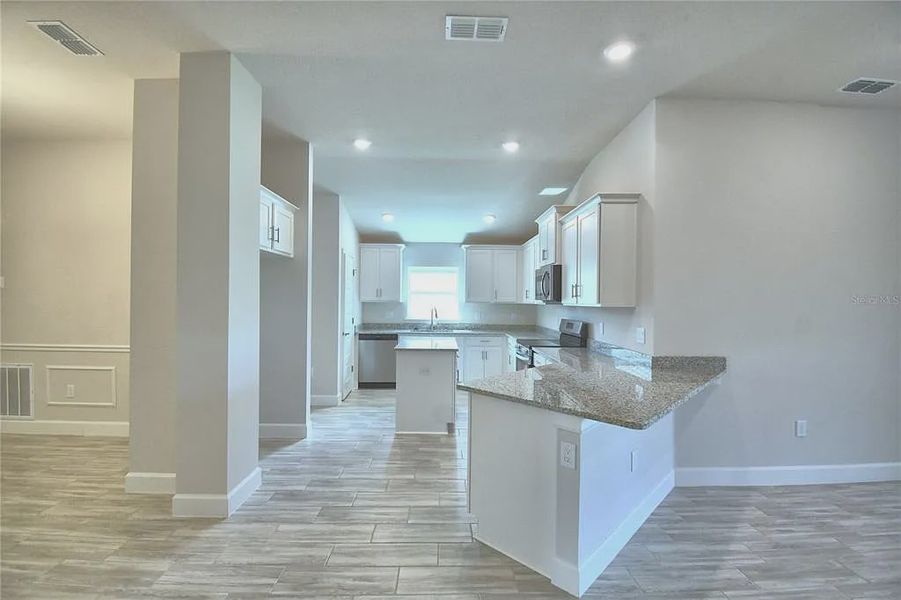 Furnished interior view inside a new home in Lake Juliana Estates, Auburndale (Image 5).