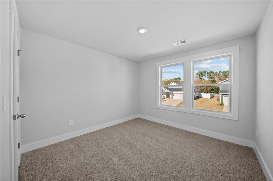 Spacious, unfurnished interior of a new home in Reserve at Arden Woods, Greenville (Image 21).