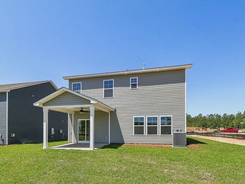 Front exterior of a new home in Providence Station at Trolley Run, Aiken, SC, highlighting curb appeal (Image 16). Front exterior of a new home in Providence Station at Trolley Run, Aiken, SC, highlighting curb appeal (Image 16).