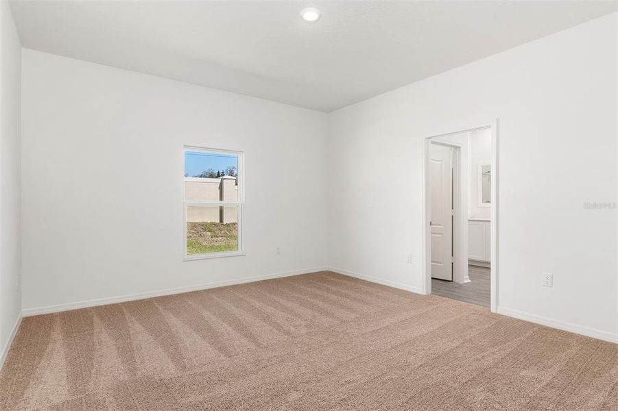 Spacious, unfurnished interior of a new home in Peach Crossings, Winter Haven (Image 9).
