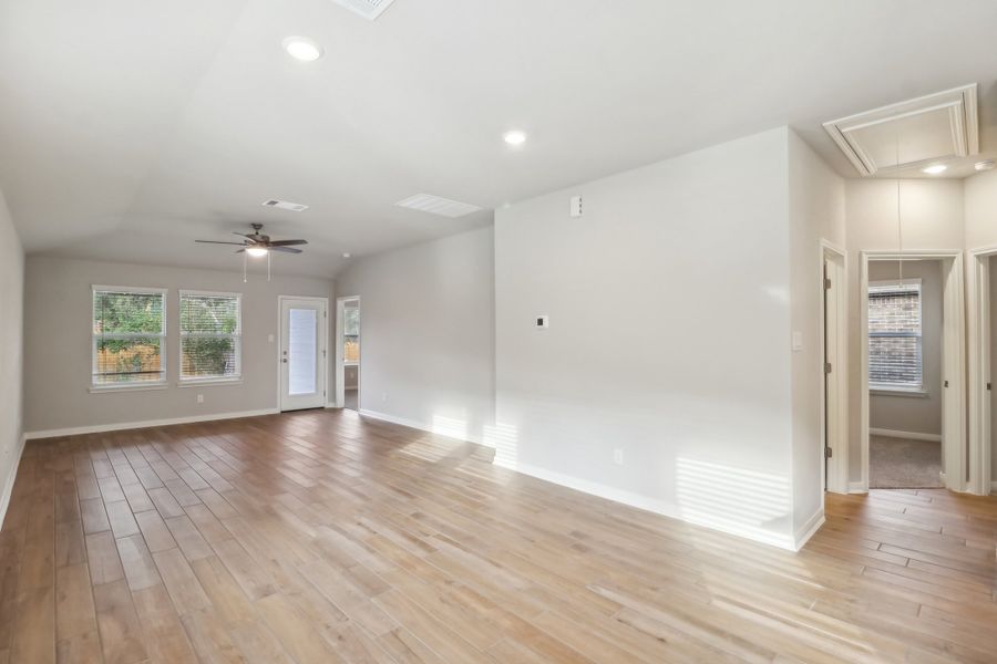 Living and dining room in the Cascade floorplan at a Meritage Homes community.